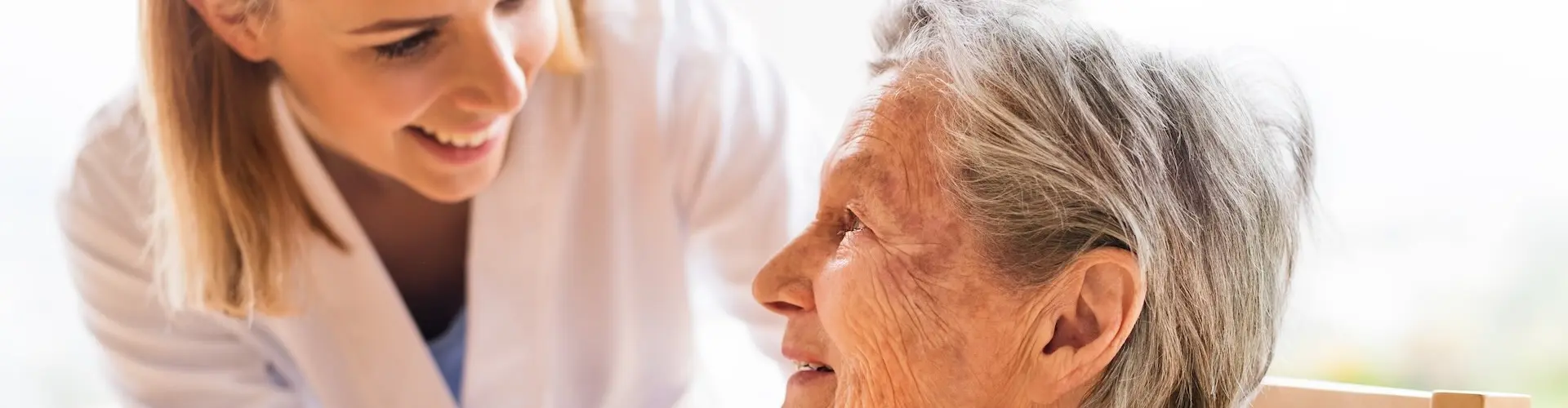 Home manager talking to resident