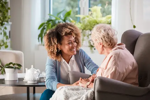 Carer with elderly patient